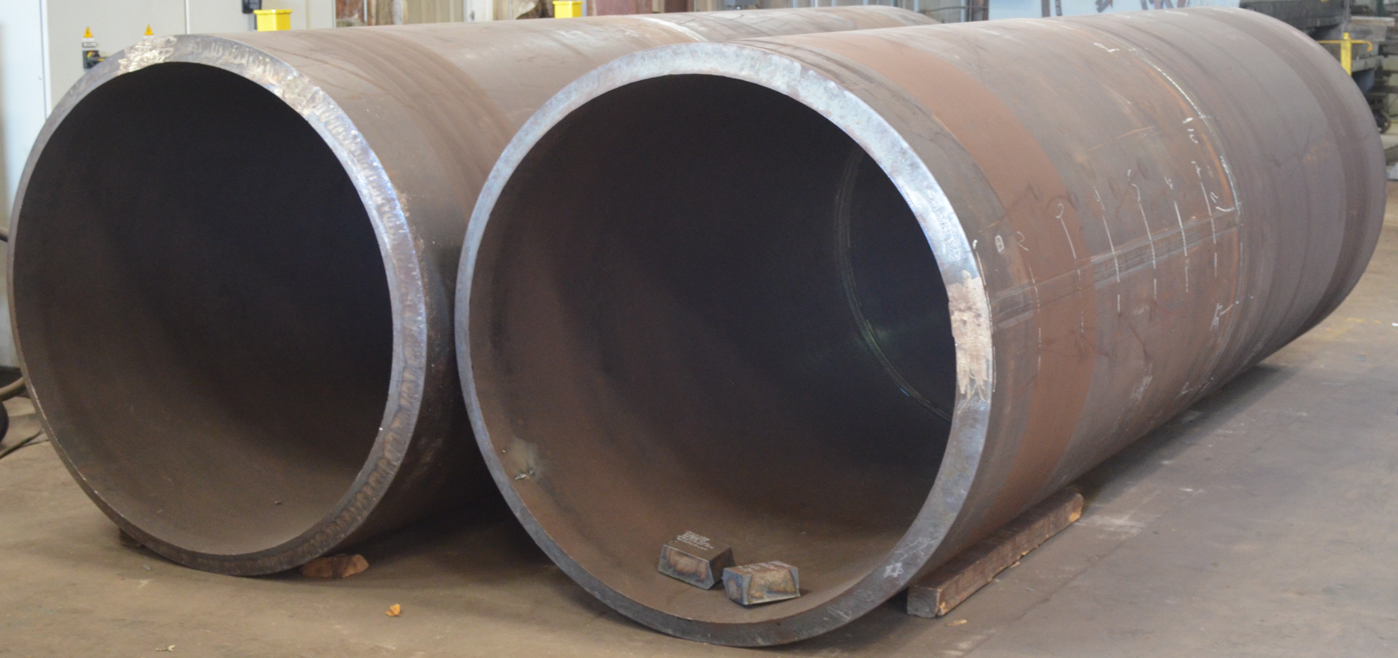 Heavy rolled and welded cylinders on the shop floor