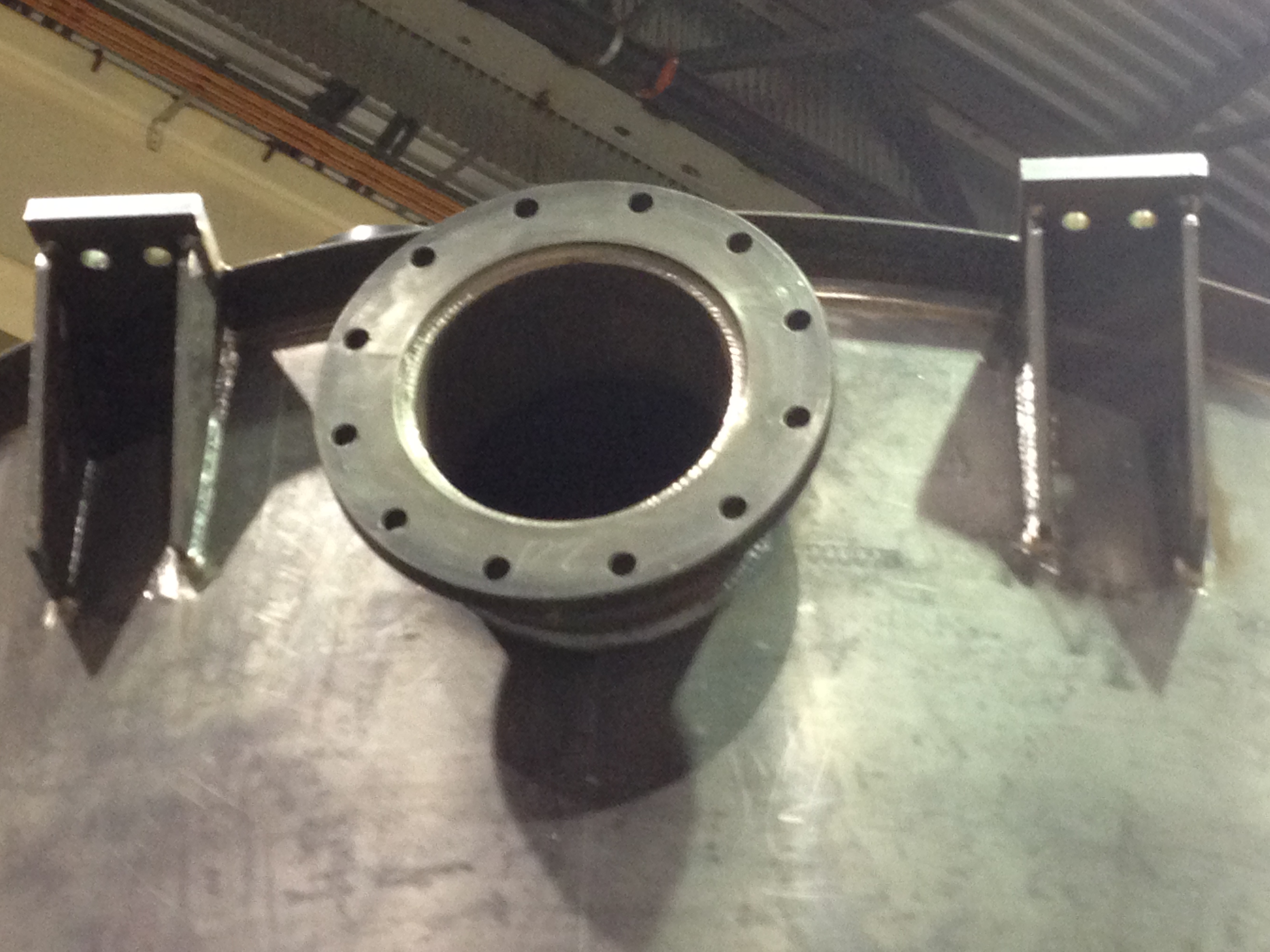 API tank nozzle and welded support pads